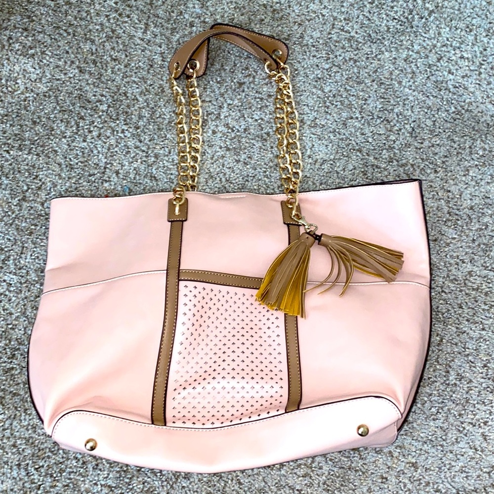 in great condition has a small stain but on the inside!!!